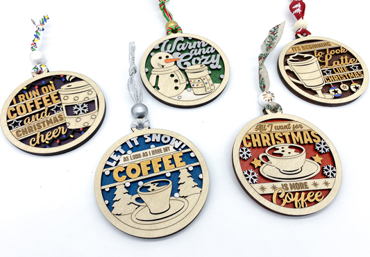 Set of five Christmas ornaments with coffee-themed designs on a white background
