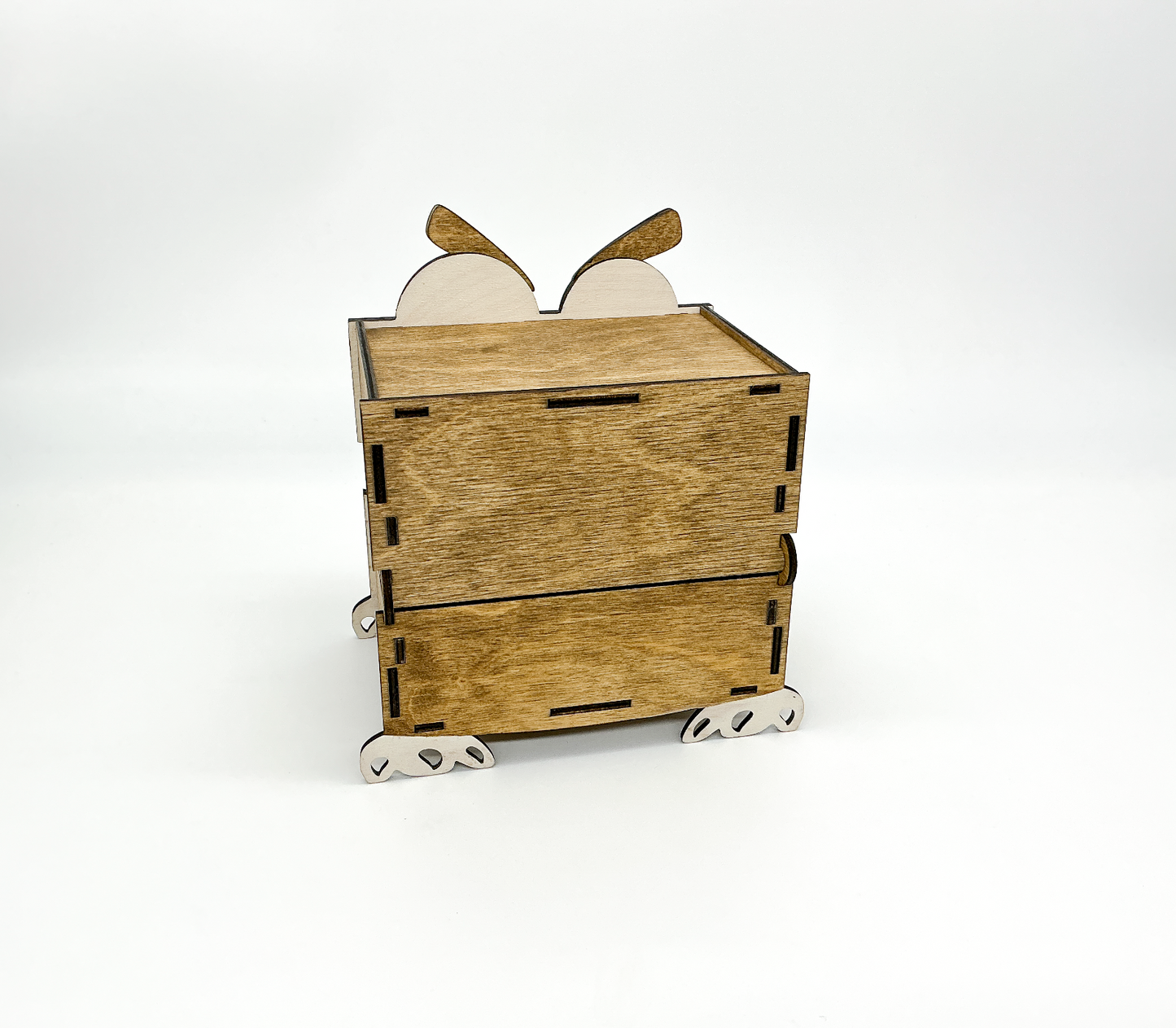 Back view of the handcrafted wooden monster box, showing its smooth, stained Walnut wood finish.