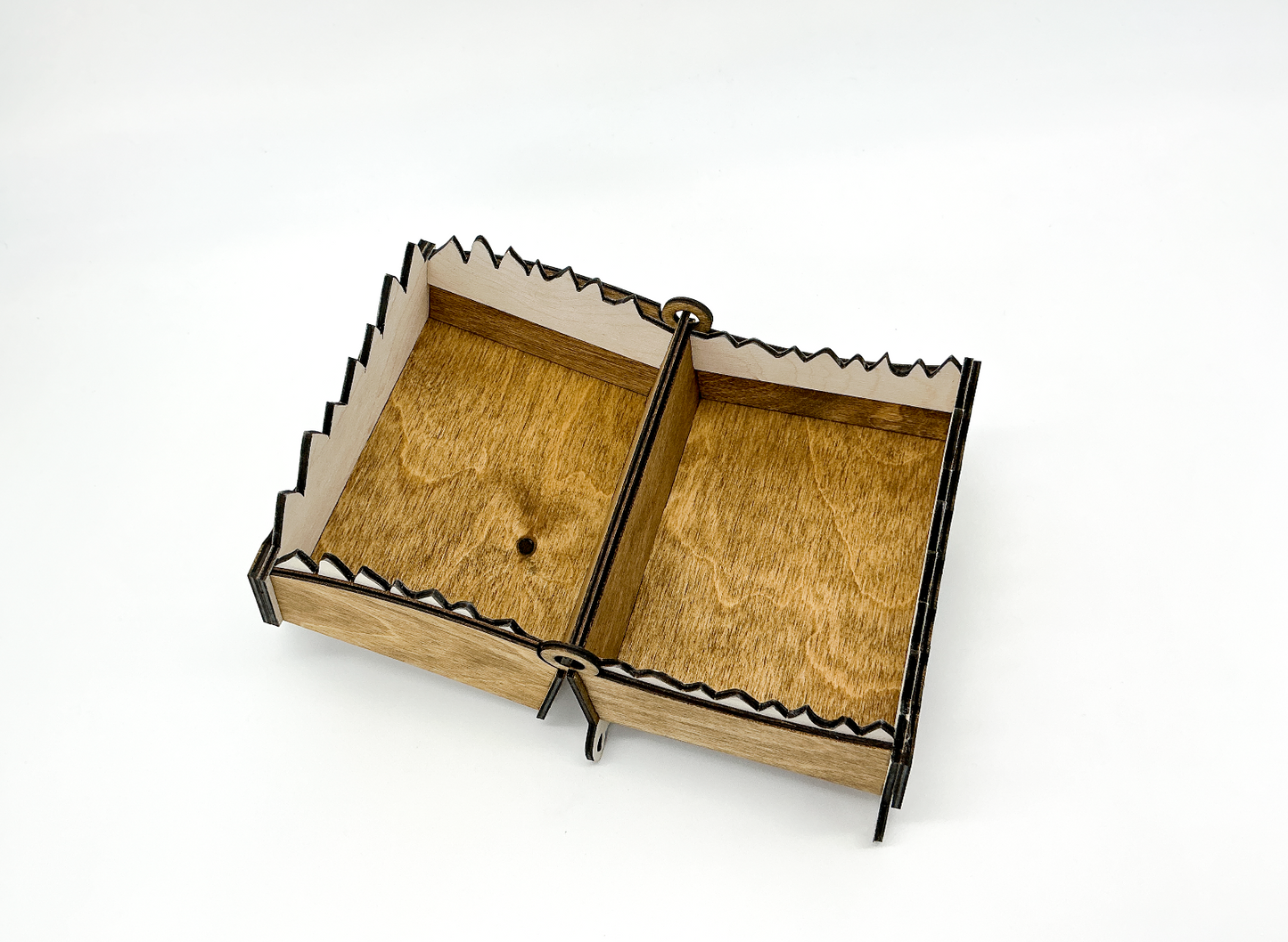 Handcrafted walnut-stained wooden monster box with googly eyes and white teeth, hinged lid open to show the empty interior.