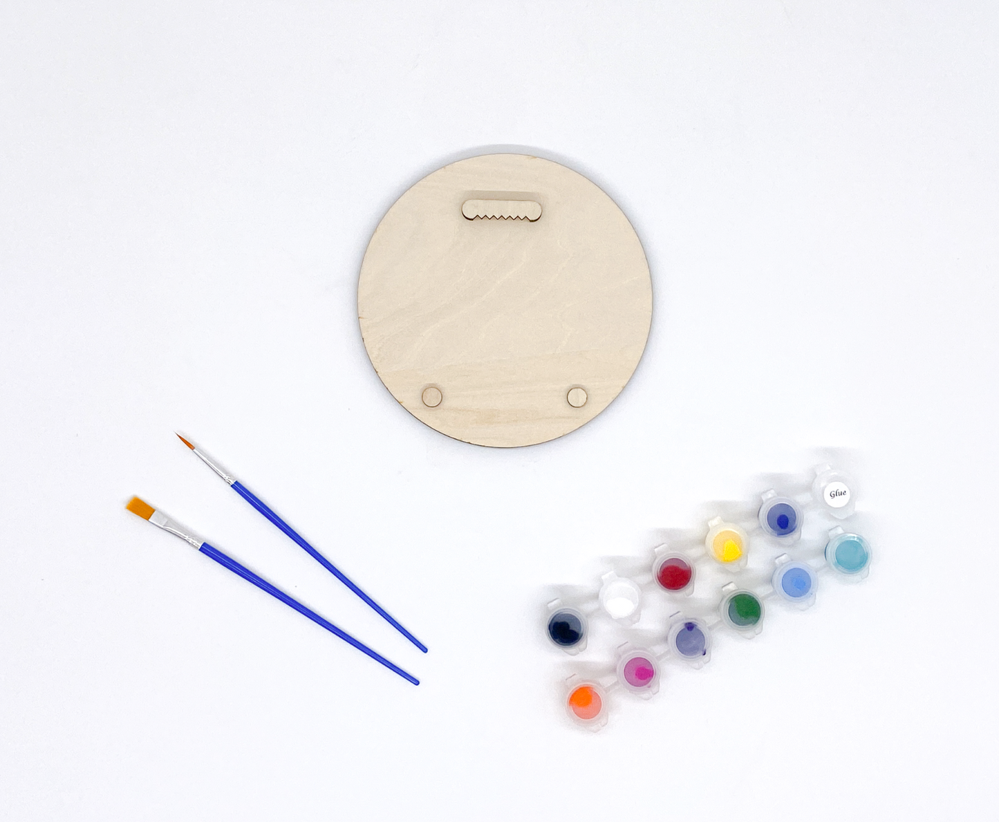The Back Of A DIY Paint Kit Featuring With Sawooth Hanger And Bumpers.