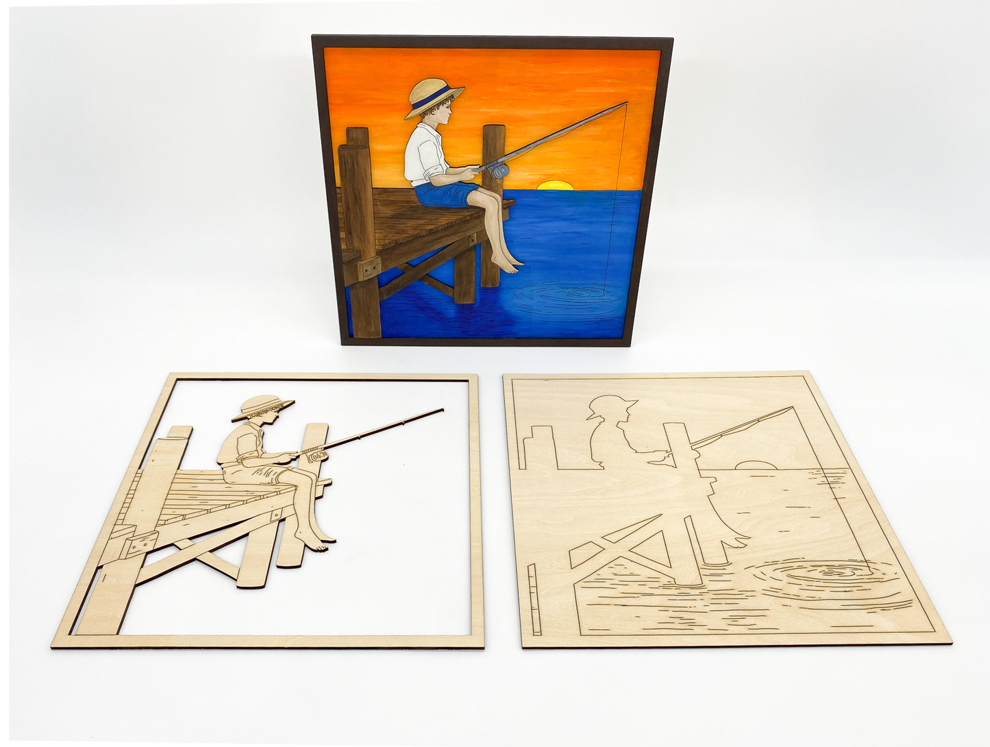 Painted layered fishing boy wall art scene with golden sunset and lakeside dock and unpainted diy kit below