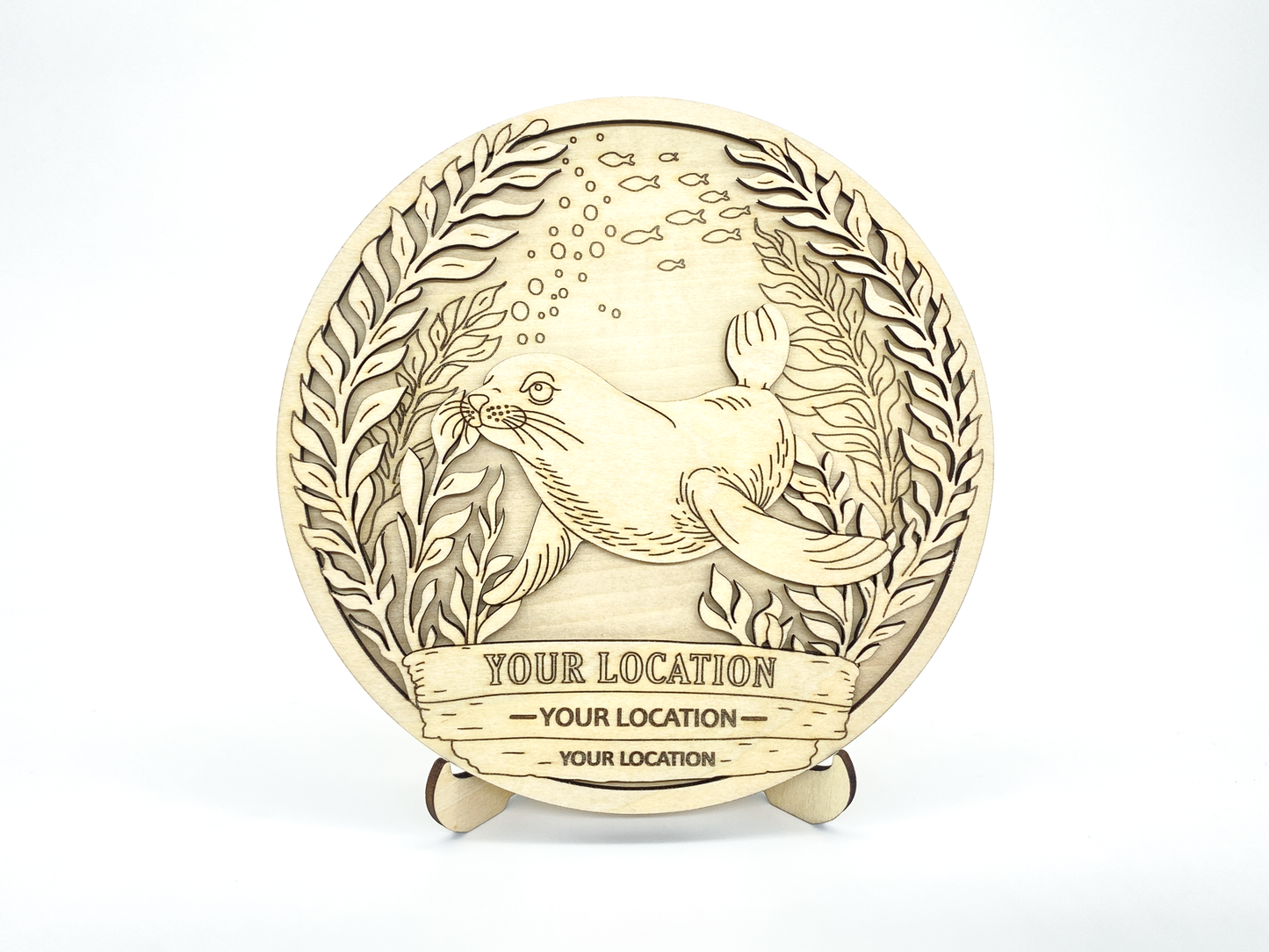 Angled view of custom sea lion ocean paint kit showing layered depth and personalized text detail