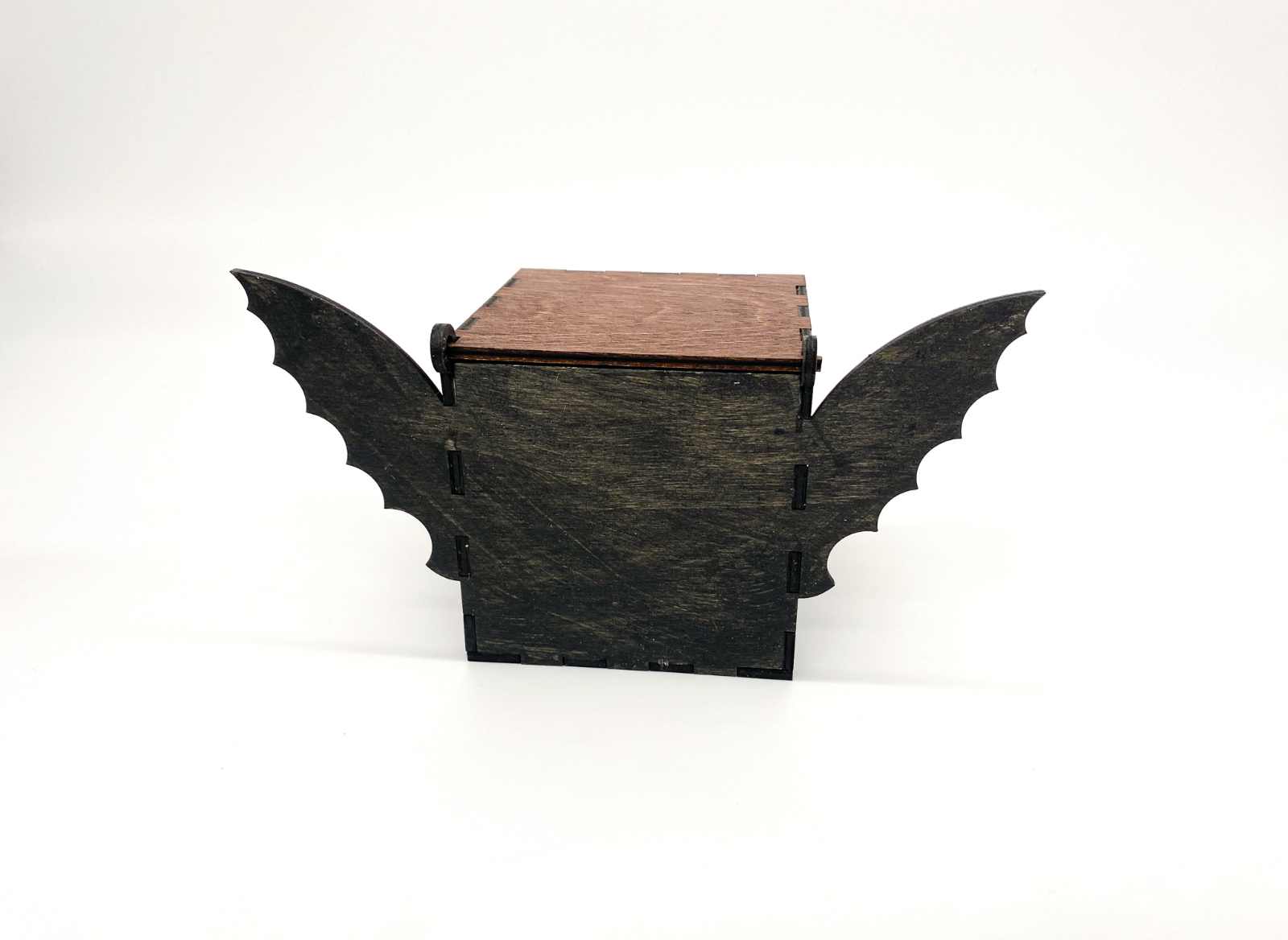 Back of a hand stained wooden bat box