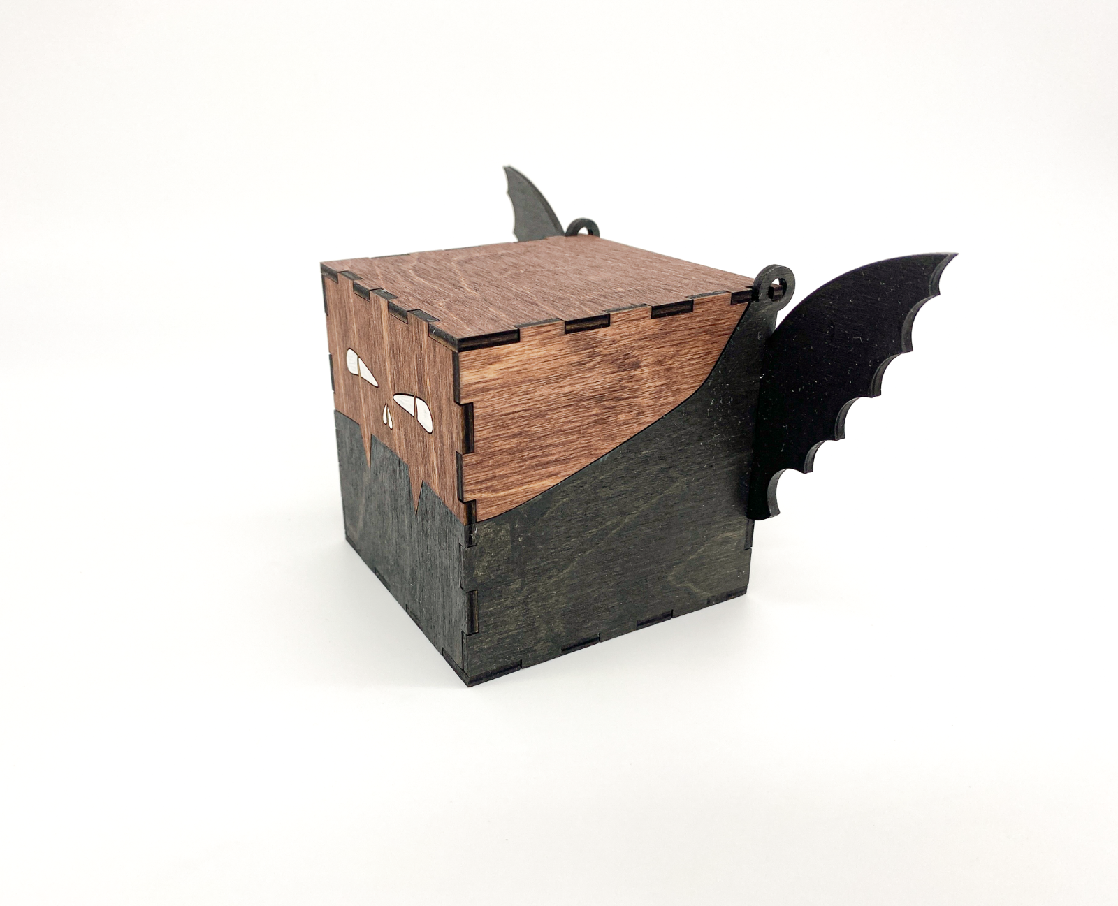 Side view of a small gothic wooden bat box for jewelry or Halloween décor.