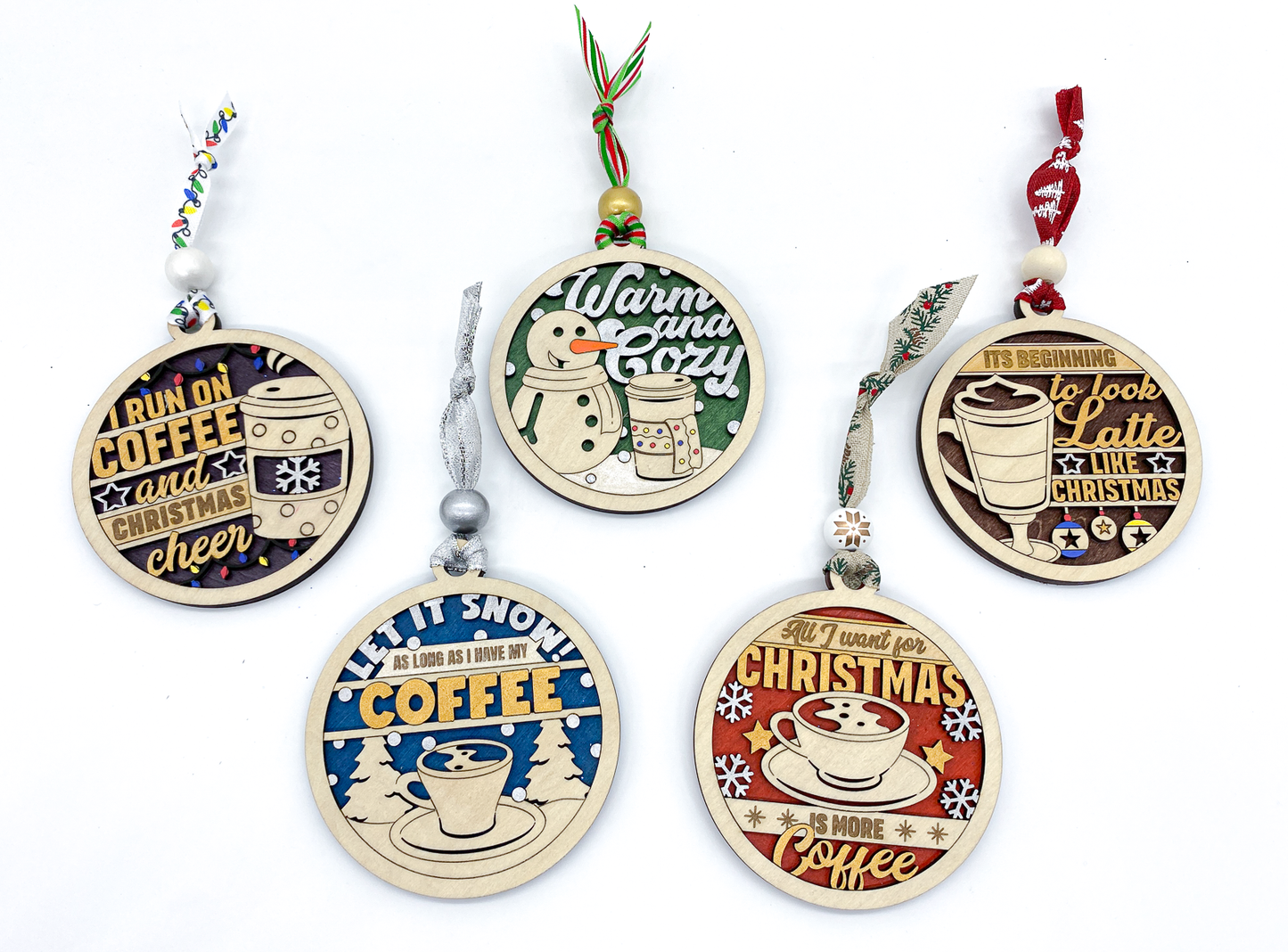 Set of Christmas ornaments with coffee-themed designs on a white background