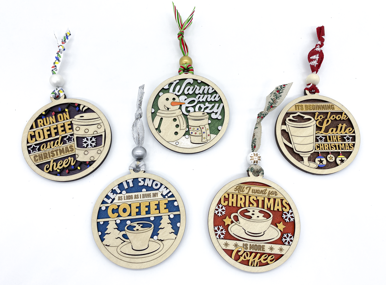 Set of Christmas ornaments with coffee-themed designs on a white background