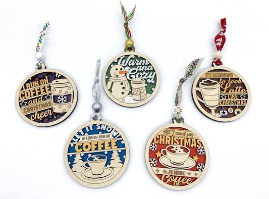 Set of Christmas ornaments with coffee-themed designs on a white background