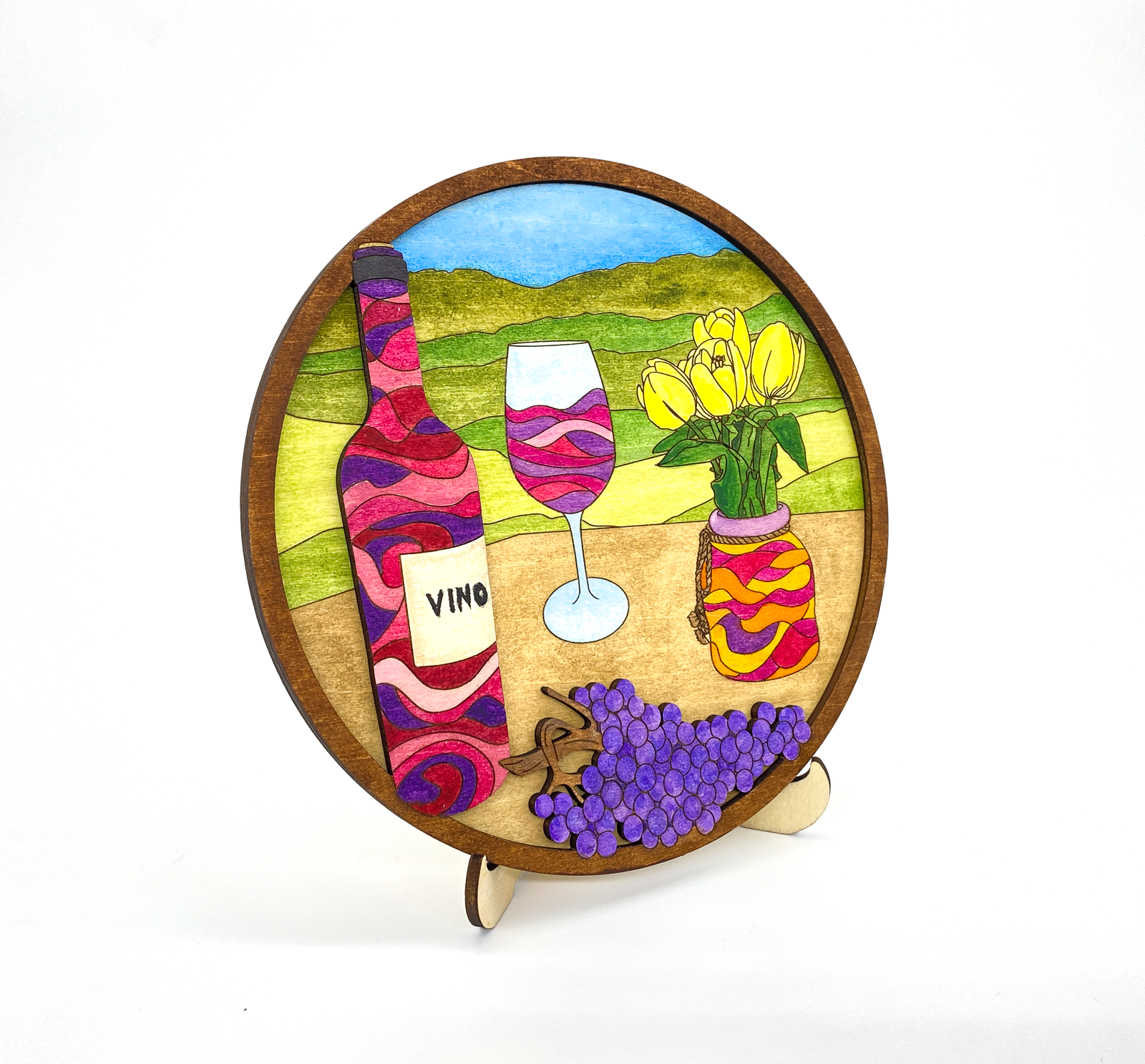 Angled view of a finished wine and vineyard wood art piece showing the 3D depth and layered wood grain.