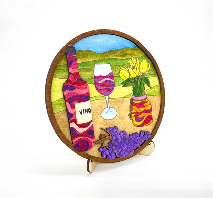 Angled view of a finished wine and vineyard wood art piece showing the 3D depth and layered wood grain.