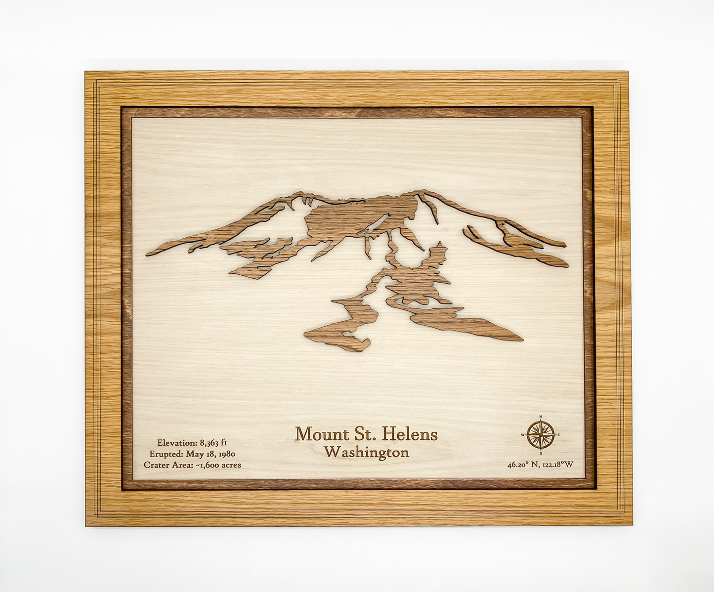 Front view of a 3D layered wood art piece featuring Mount St. Helens with engraved elevation and eruption date facts