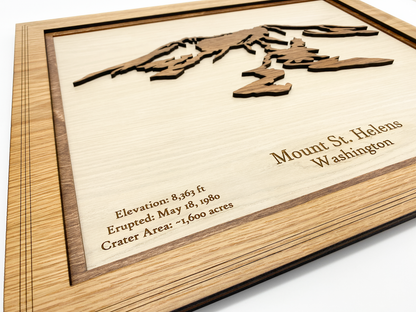 Close-up of the engraved topography details on a 19x23 inch wood map of Mount St. Helens.
