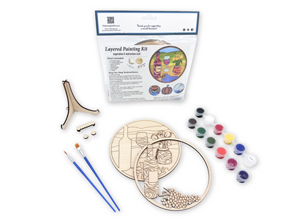 Wine and tulips painting kit for adults shown with packaged kit, unpainted layered wood pieces, paint pots, brushes, glue, and display stand.