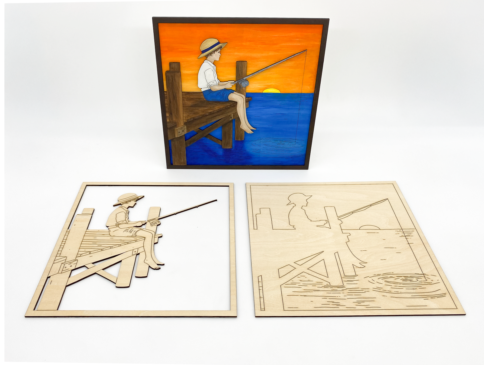 Painted layered fishing boy wall art scene with golden sunset and lakeside dock and unpainted diy kit below