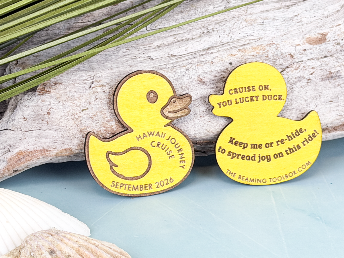 Personalized wooden cruise duck showing custom cruise information on the front and engraved re-hide message on the back.