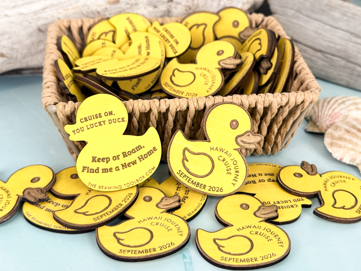 Basket filled with personalized yellow wooden cruise duck tokens for hiding and sharing during a cruise vacation.