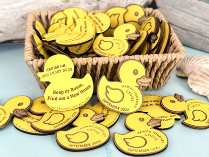 Basket filled with personalized yellow wooden cruise duck tokens for hiding and sharing during a cruise vacation.