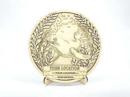 Angled view of custom sea lion ocean paint kit showing layered depth and personalized text detail