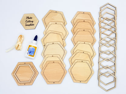 Hexagonal wooden photo cutting template kit with multiple nested hexagonal wood pieces, a stack of laser-cut geometric frames, a small wooden 'Photo Cutting template' sign, a roll of cream colored string, and a bottle of wood glue on a white background.