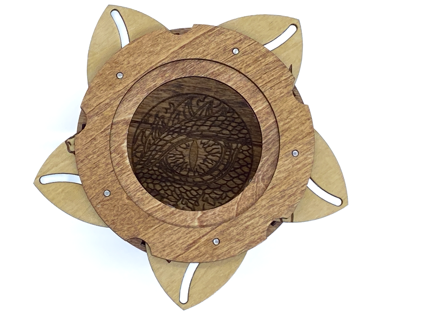 Interior of dragon keepsake box revealing an engraved dragon eye beneath the iris opening.