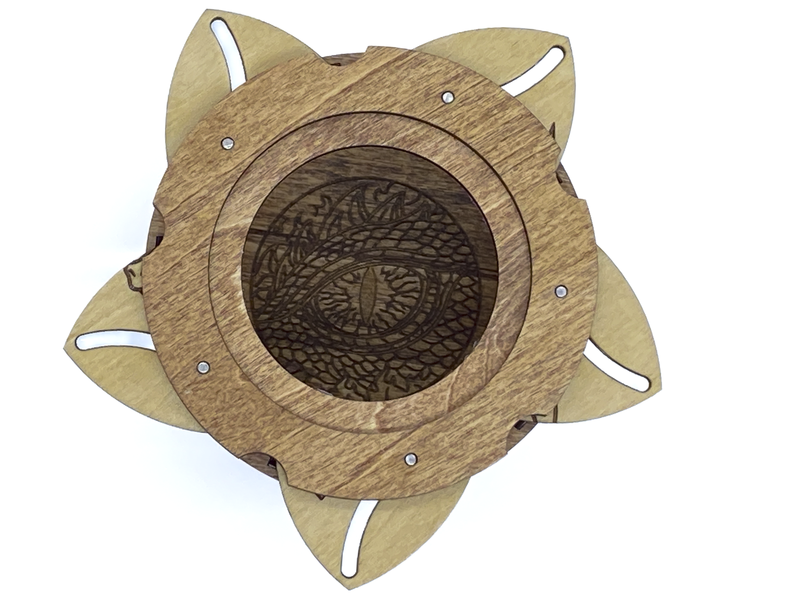 Interior of dragon keepsake box revealing an engraved dragon eye beneath the iris opening.