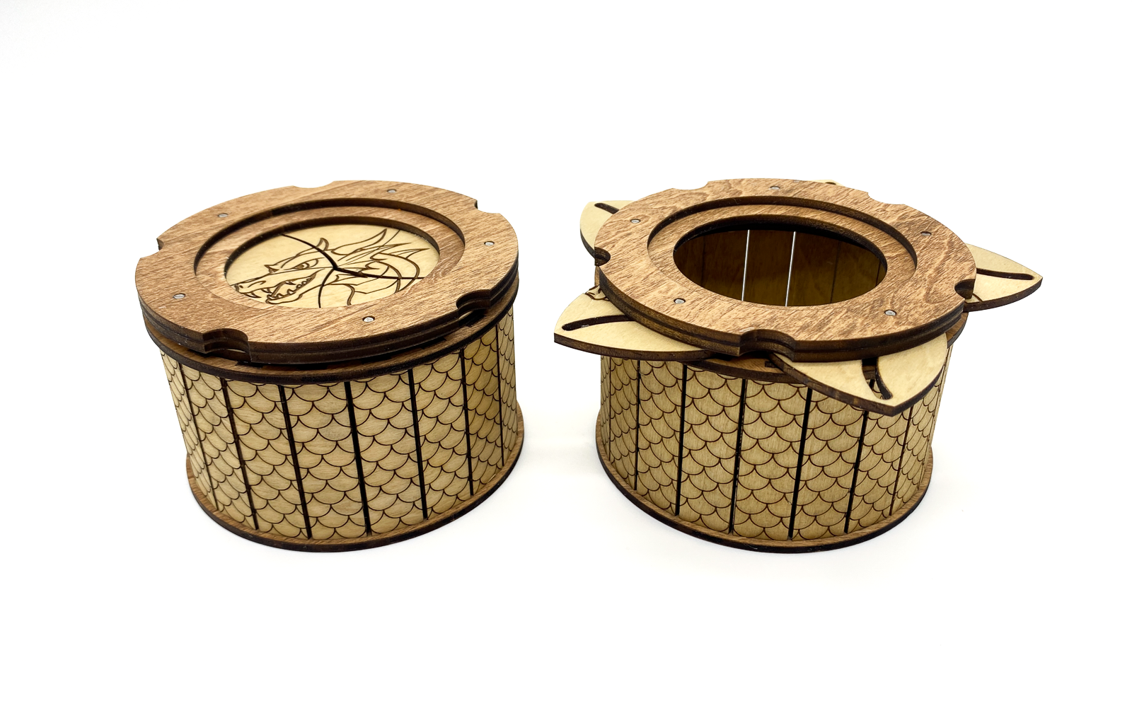 Dragon keepsake box shown closed and opened to display the mechanical iris opening system.