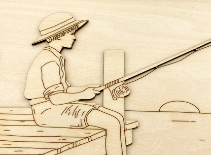 Close-up of painted fishing boy kit showing layered wood detail 