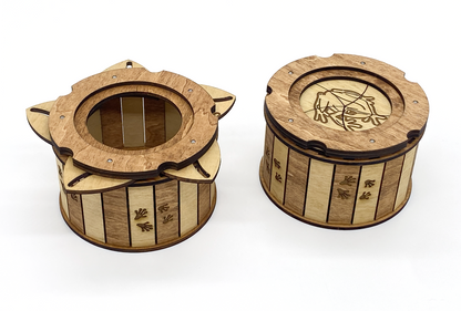 Wooden Frog Keepsake Box shown open and closed to demonstrate the unique twist-open iris mechanism.