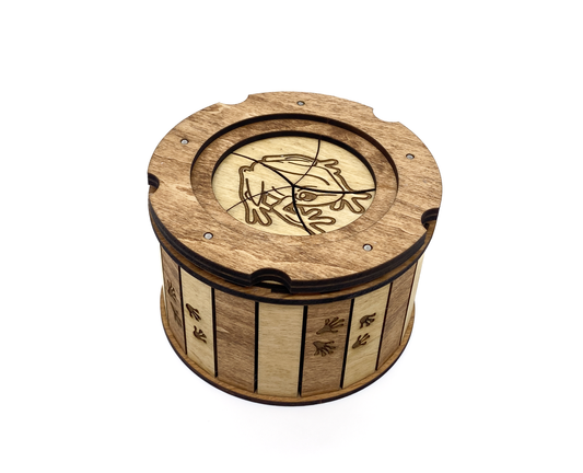 Front view of the handcrafted Frog Keepsake Box with engraved frog lid and decorative frog footprints.