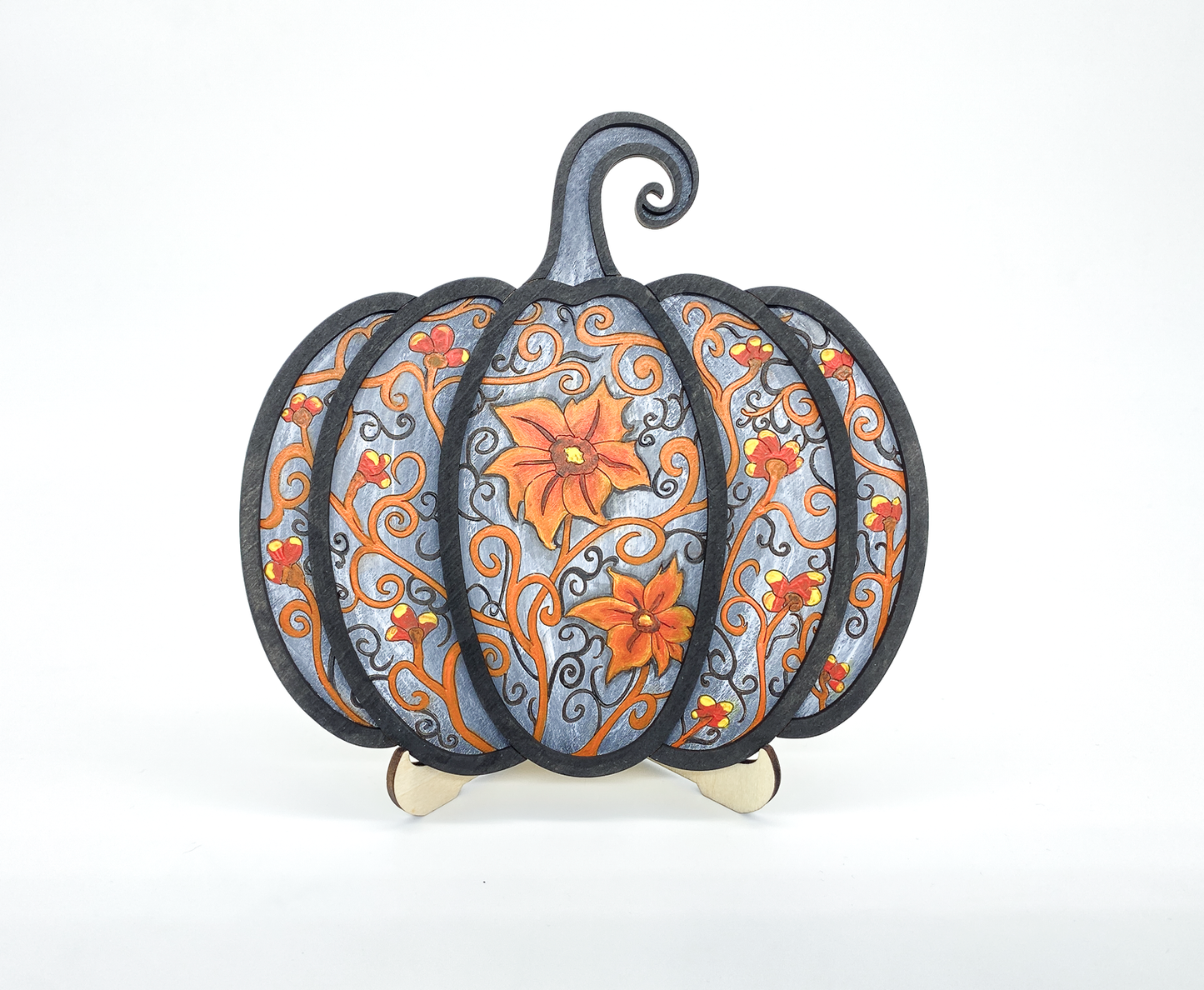 Painted gothic pumpkin layered wood paint kit with floral scroll design on white background front view