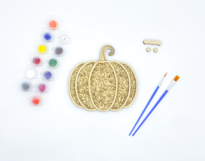 Unpainted gothic pumpkin layered wood kit with stacked basswood pieces, paint pots, brushes and hanger hardware