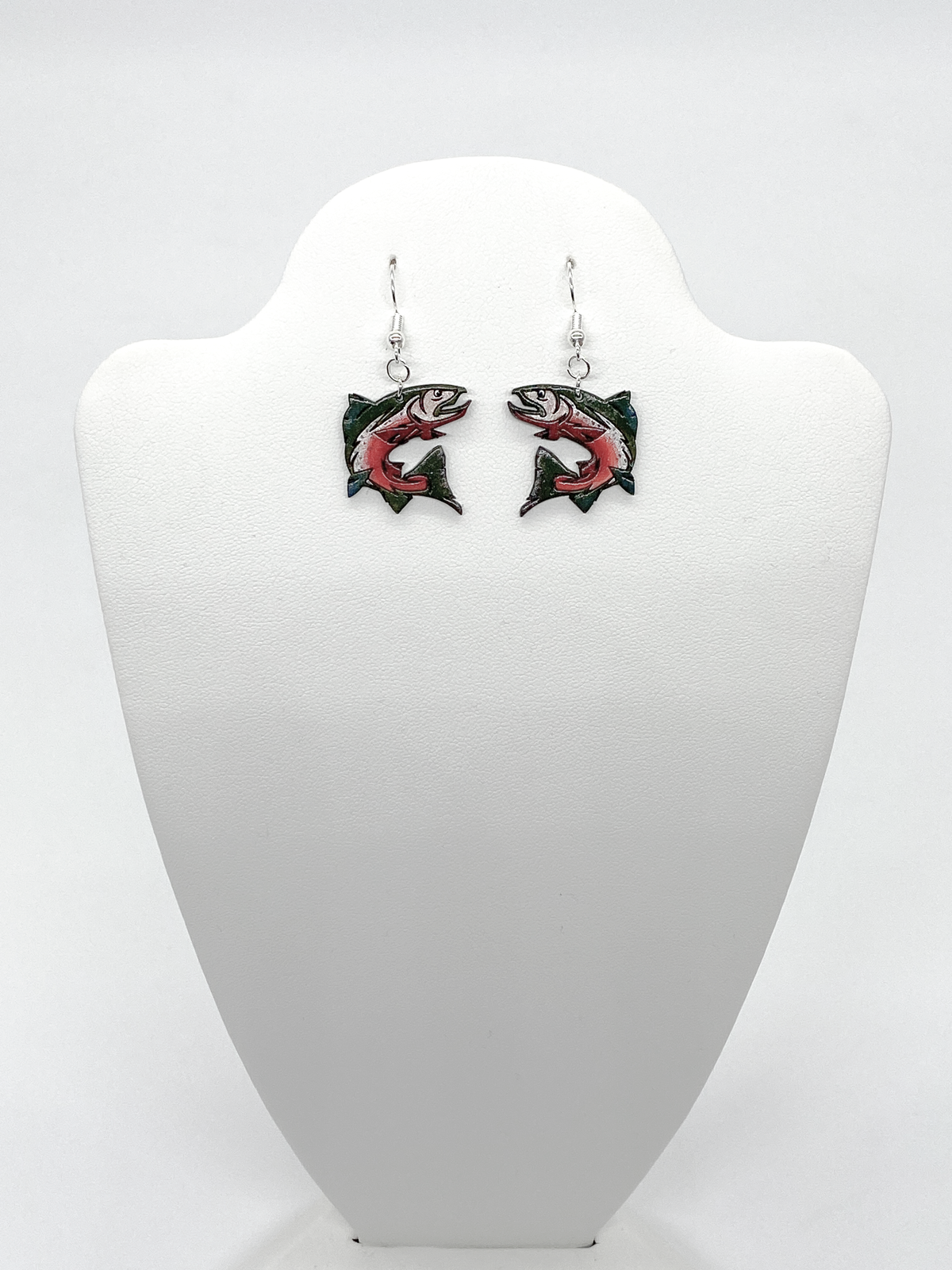 Stylized hand-painted wooden jumping salmon earrings in green, silver and salmon color