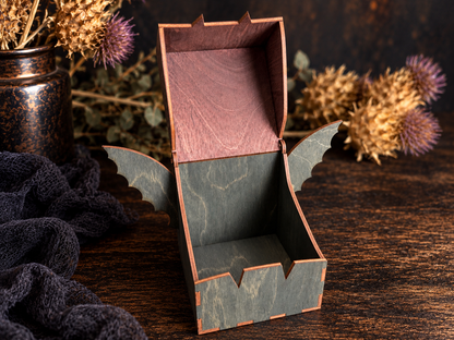 Open handmade wooden bat keepsake box showing the hinged lid, spacious interior, dark stained wings, and natural wood grain for storing small treasures.