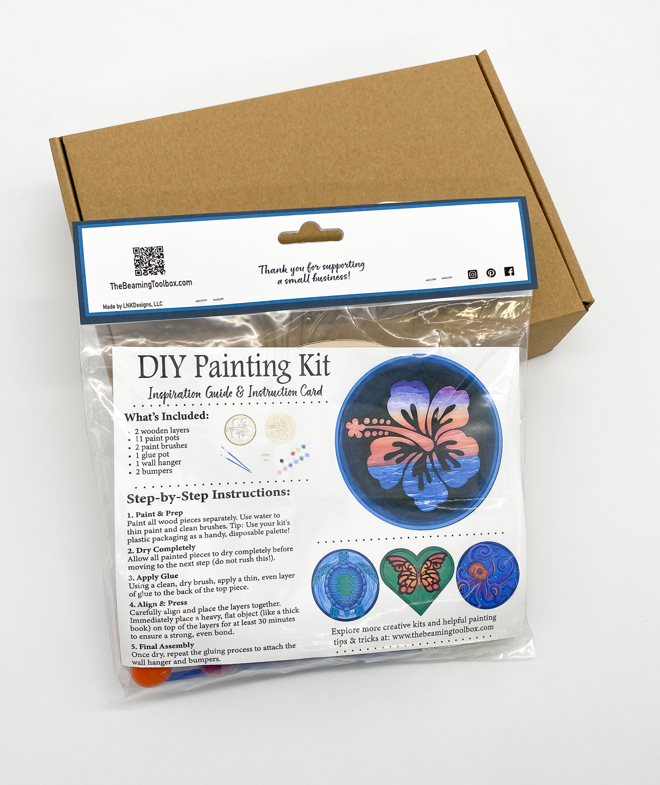 Back of Hawaiian Hibiscus DIY paint kit packaging with insert displaying finished painted hibiscus flower example and kit contents information