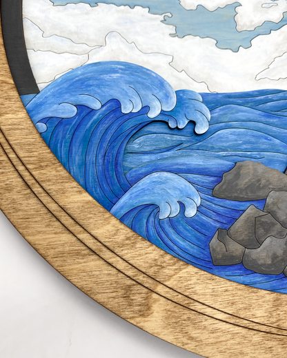 Macro shot of the 4-layer construction showing the depth of the crashing waves and the natural wood grain visible through the blue glazes.