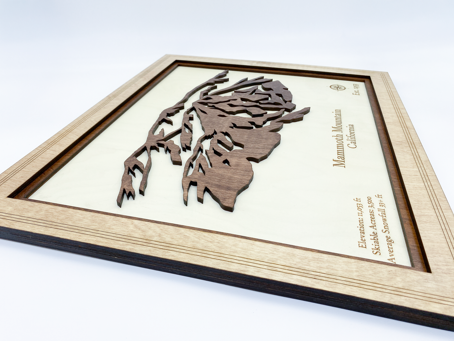 Close-up view showing layered depth and shadow in Mammoth Mountain wood relief wall art