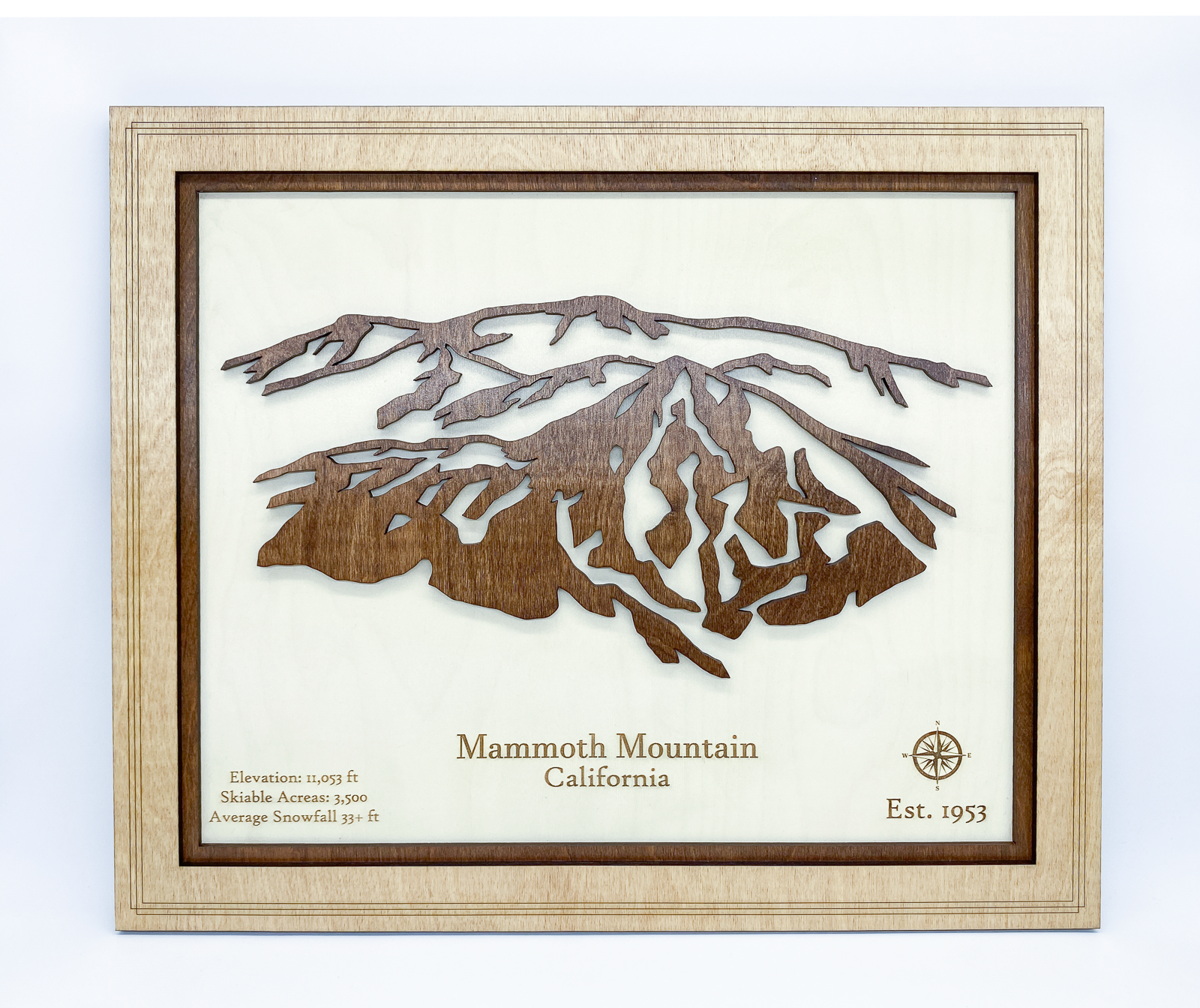 Layered wood relief art of Mammoth Mountain California featuring a modern mountain silhouette and engraved details
