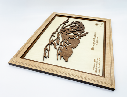 Side view of Mammoth Mountain wood relief art showing layered construction and one-inch depth