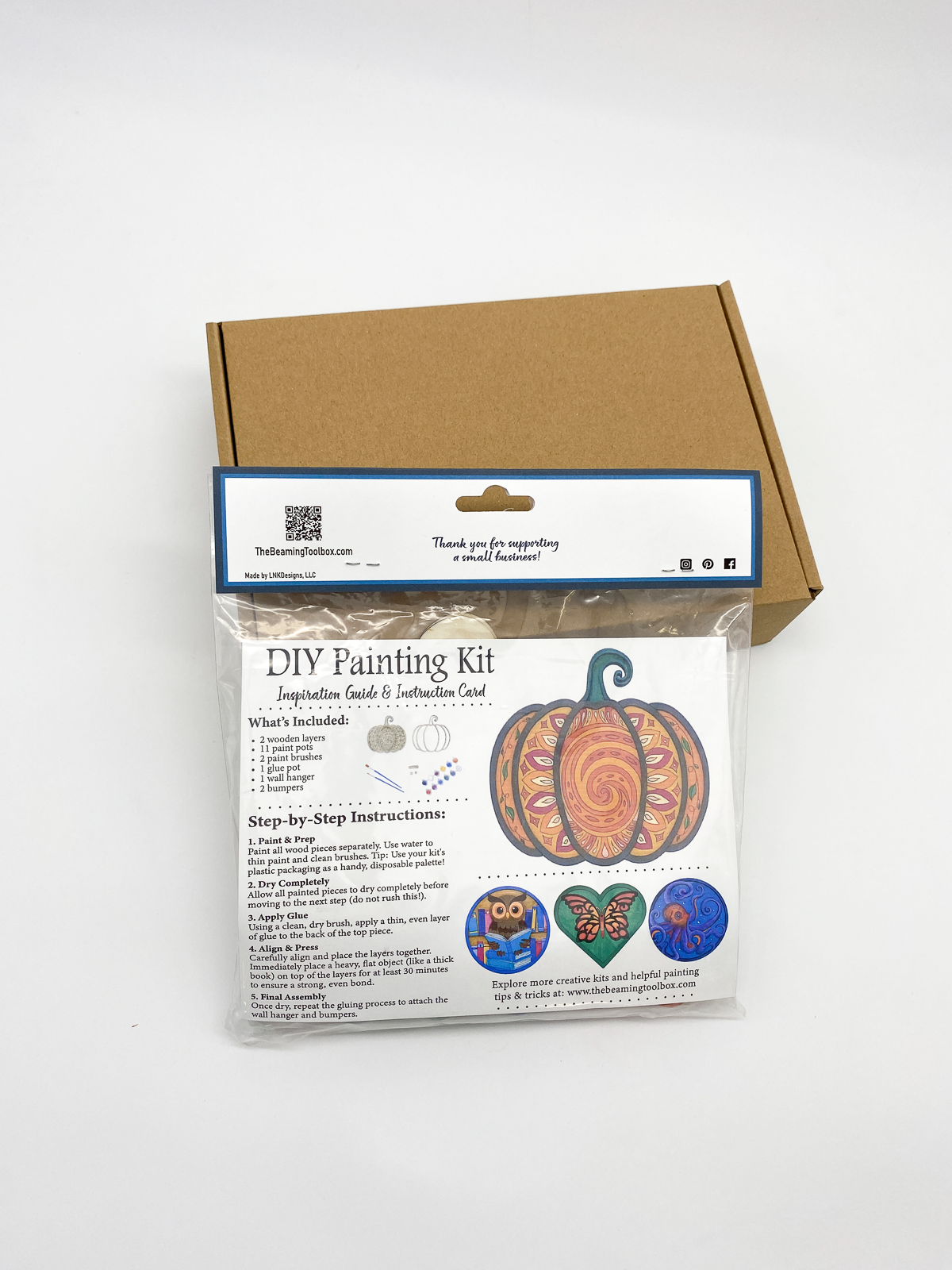 Back of Pumpkin Mandala DIY paint kit packaging with insert displaying finished painted mandala pumpkin example and kit contents details