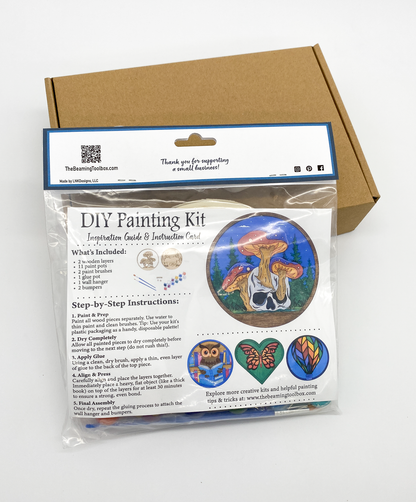 Back of Mushroom Skull DIY paint kit packaging with insert displaying finished painted skull and mushrooms example and kit contents information