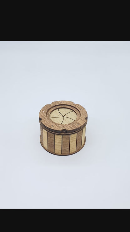 Watch the handcrafted wooden keepsake box smoothly open with its unique twist-open iris mechanism, revealing a hidden storage compartment perfect for jewelry, dice, crystals, coins, and other small keepsakes.