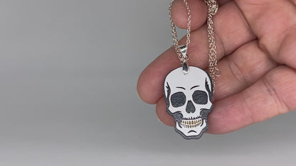 Skull Necklace and Earrings with silver plated accents.  Video for sizing.