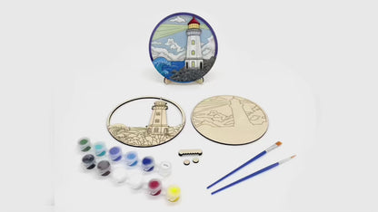 Time-lapse video of painting and assembling a layered wood lighthouse DIY paint kit and displaying the finished coastal art piece