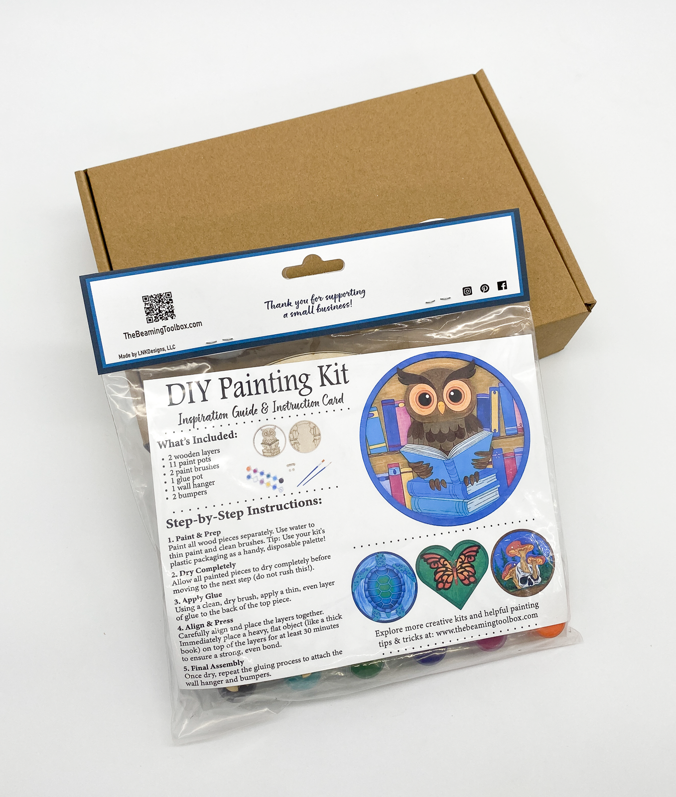 Back of Reading Owl DIY paint kit packaging with insert showing finished painted owl on books example and kit contents details