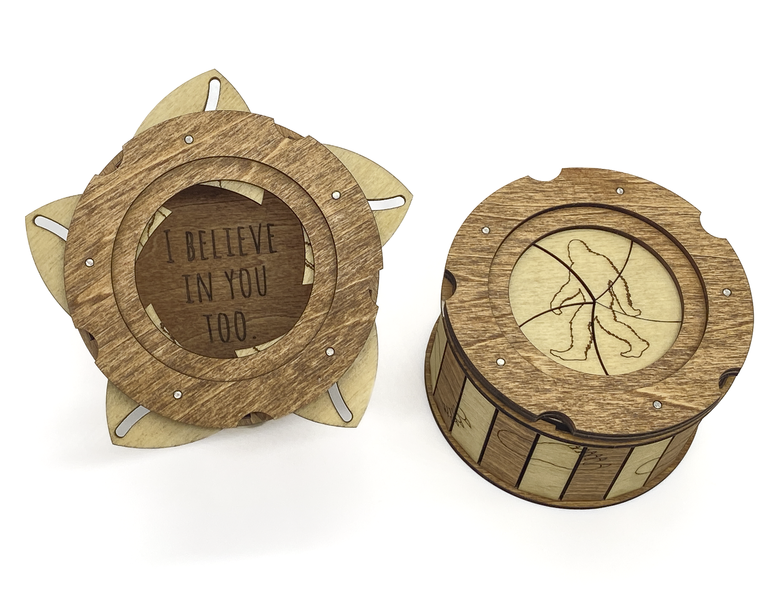 Sasquatch iris box showing hidden message inside and engraved Bigfoot silhouette on the top lid.