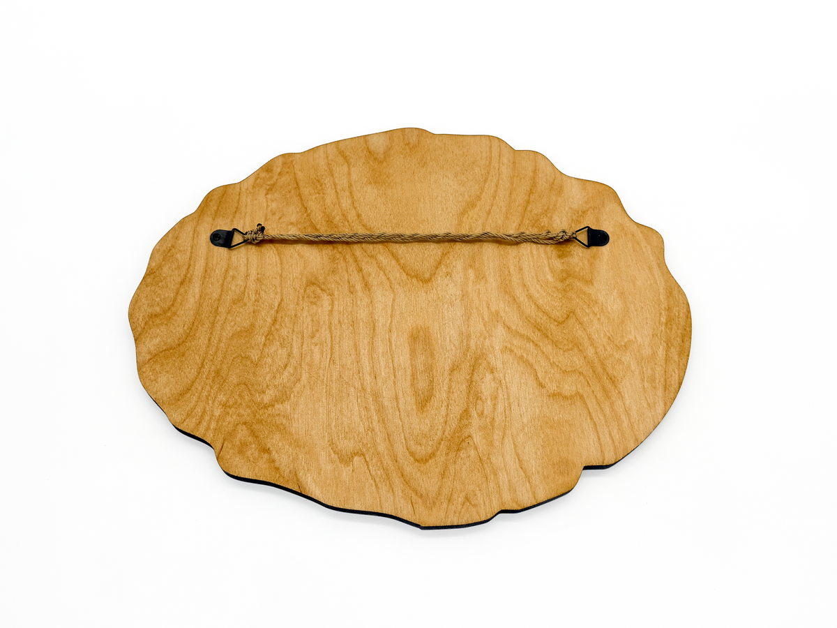 Back view of Sawdust = Man Glitter wooden wall art showing the stained wood finish and attached hanging cord.