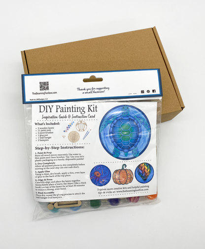 Back of Sea Turtle DIY paint kit packaging with insert displaying finished painted sea turtle example and kit contents information