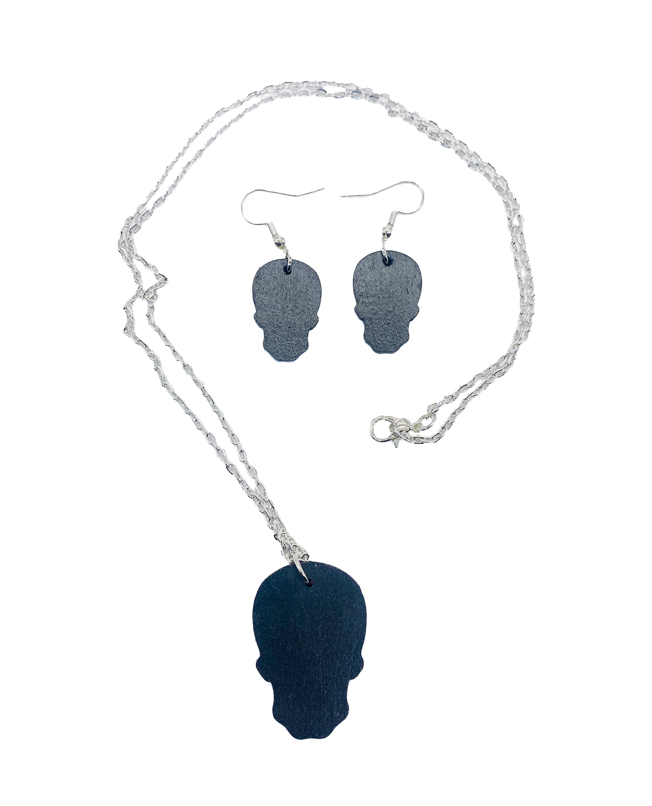 Back view of the wood skull necklace and earrings with silver-plated chain and hooks.