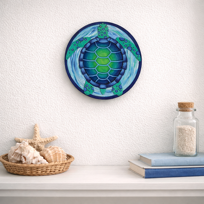 Completed DIY wood painting craft kit of a sea turtle on a white wall above a shelf with decorative items.