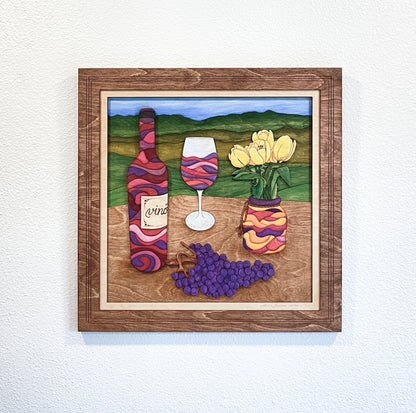 Front view of Wine and Tulips original layered wood fine art featuring wine bottles, tulips, grapes, and vineyard hills in sculptural hand-painted detail.