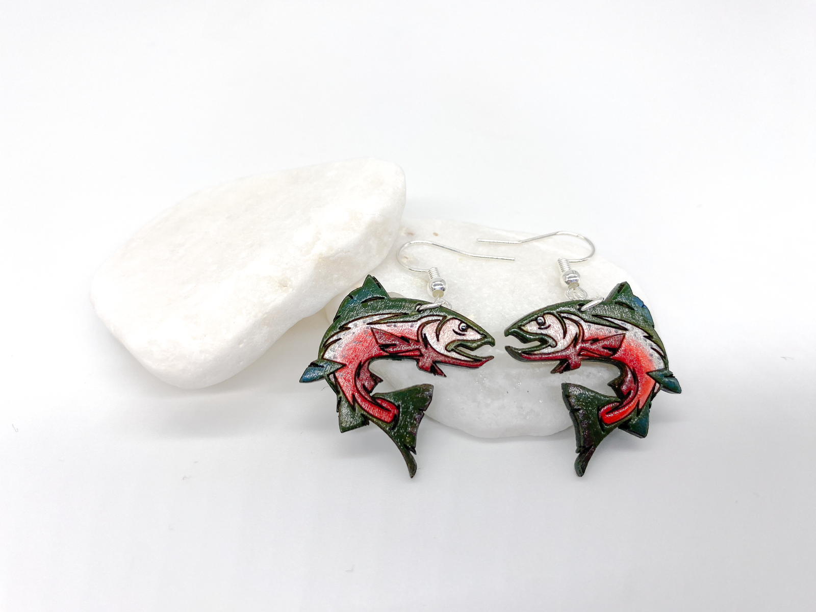 Stylized hand-painted wooden jumping salmon earrings in green and silver